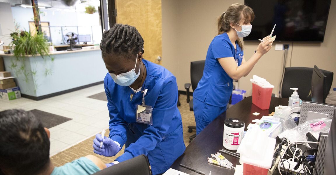 Photo of two nurses with masks