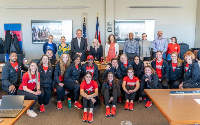 The MSU Denver women's basketball team takes a photo at the Board of Trustees meeting on Friday, March 18, 2022.