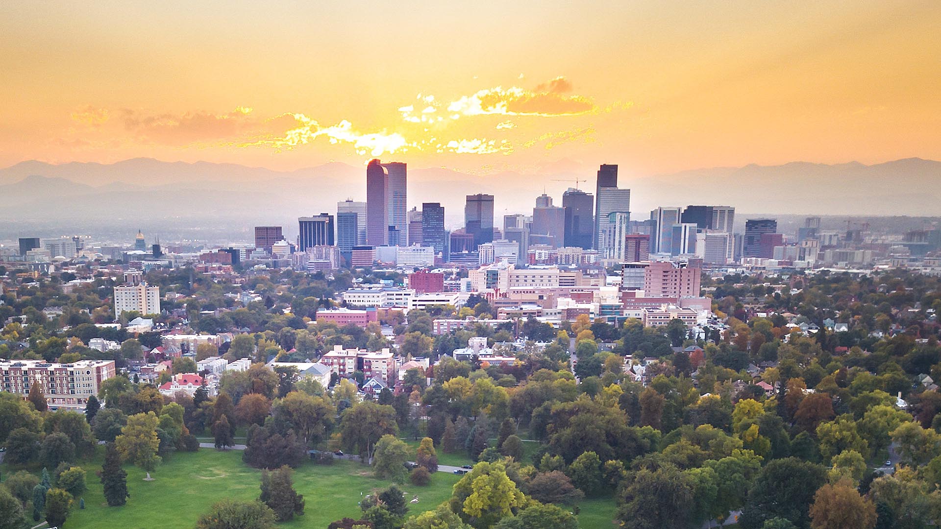 View of Denver skyline at sunset with haze