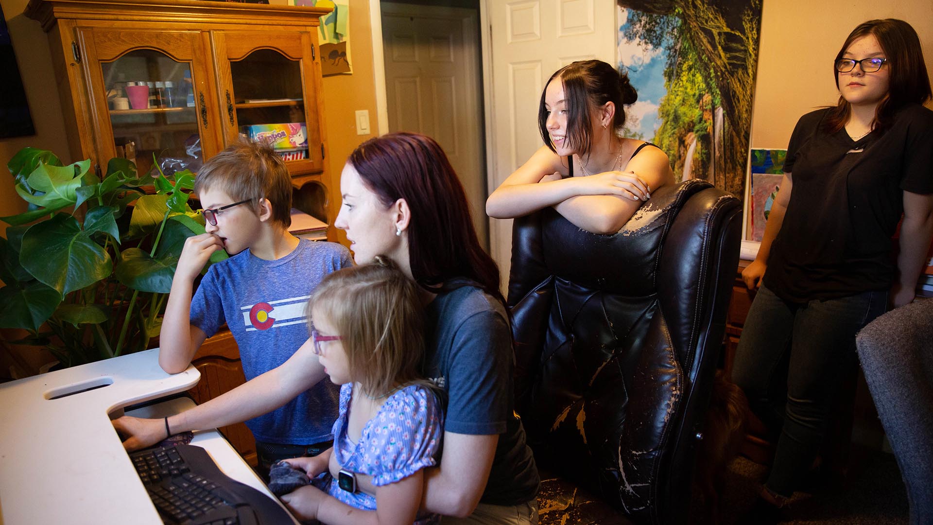 MSU Denver student Heidi Keryan at home with her children from left to right Stefan, Phoenix, Sativa and Gabriella.
