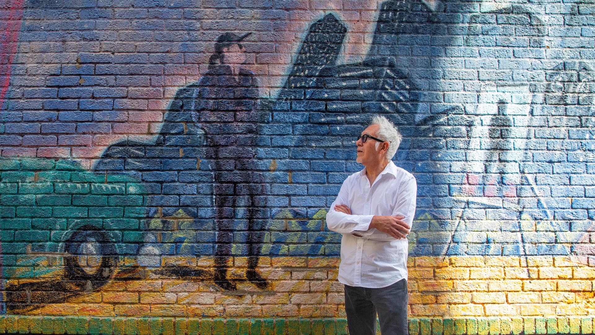 Carlos Fresquez and mural