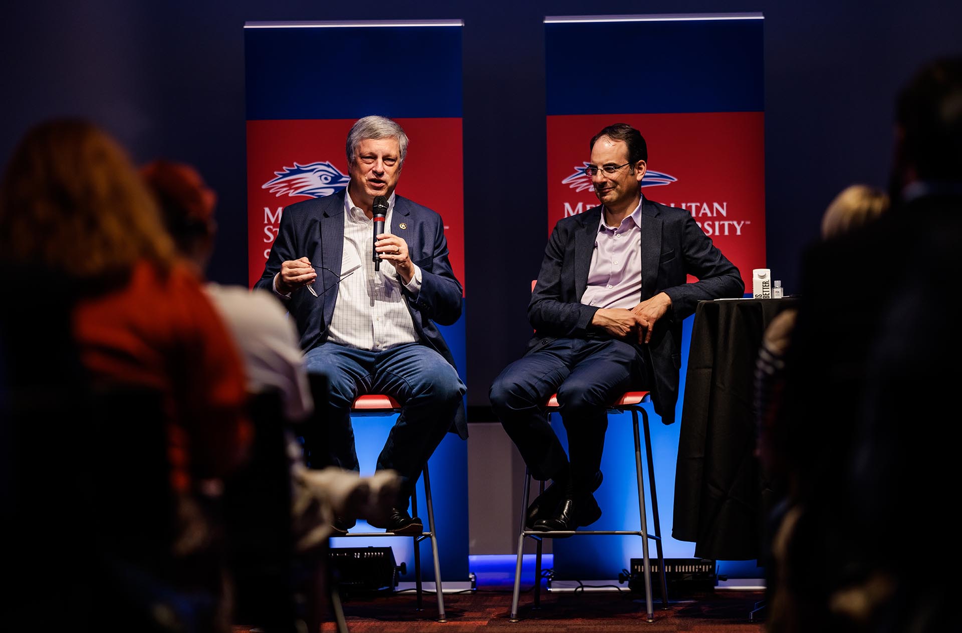 Former Colorado Secretary of State Wayne Williams, left, and Colorado Attorney General Phil Weiser at the panel on free speech and the art of democracy.