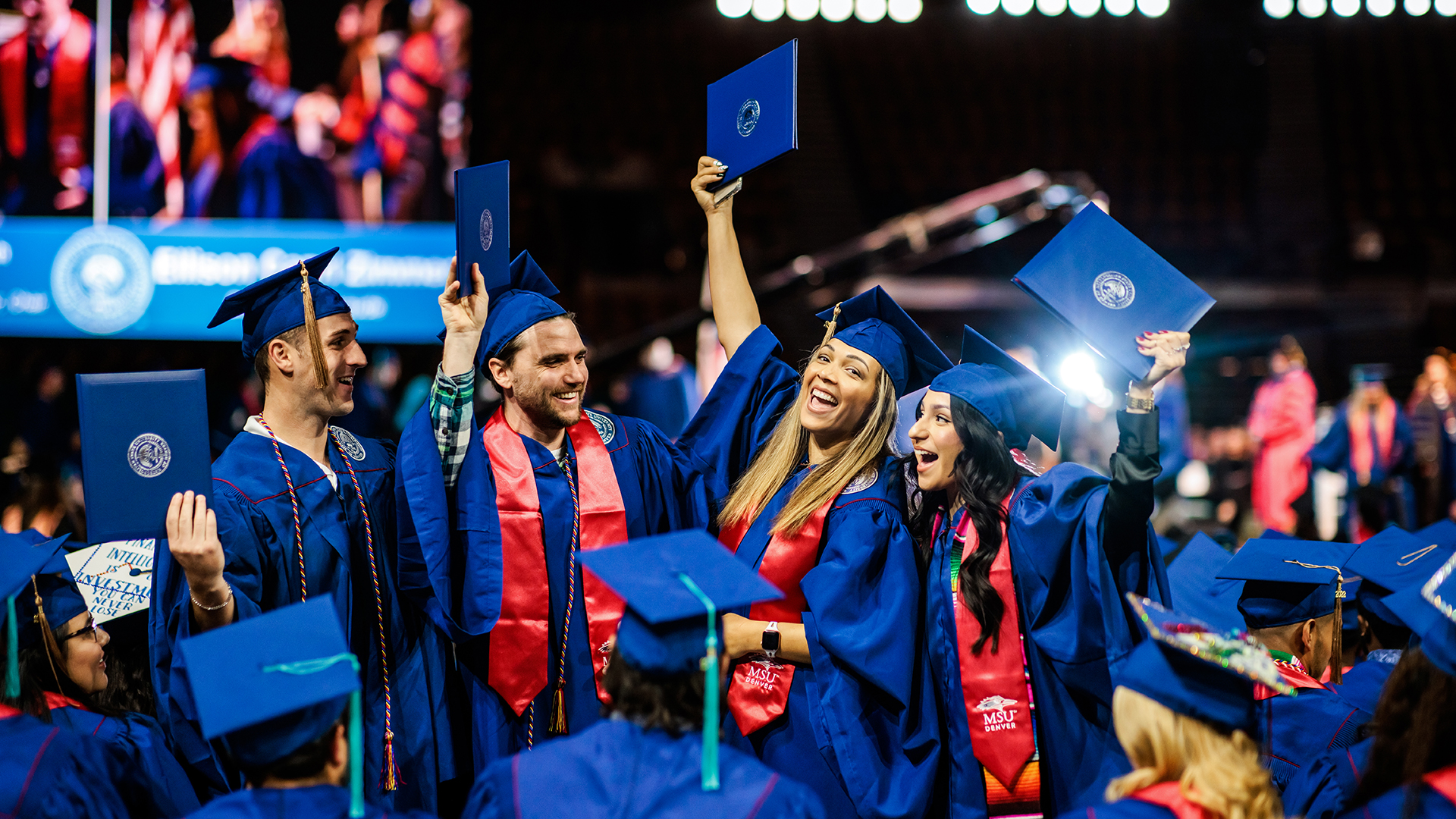 PHOTOS: Graduates take the stage at Denver Coliseum