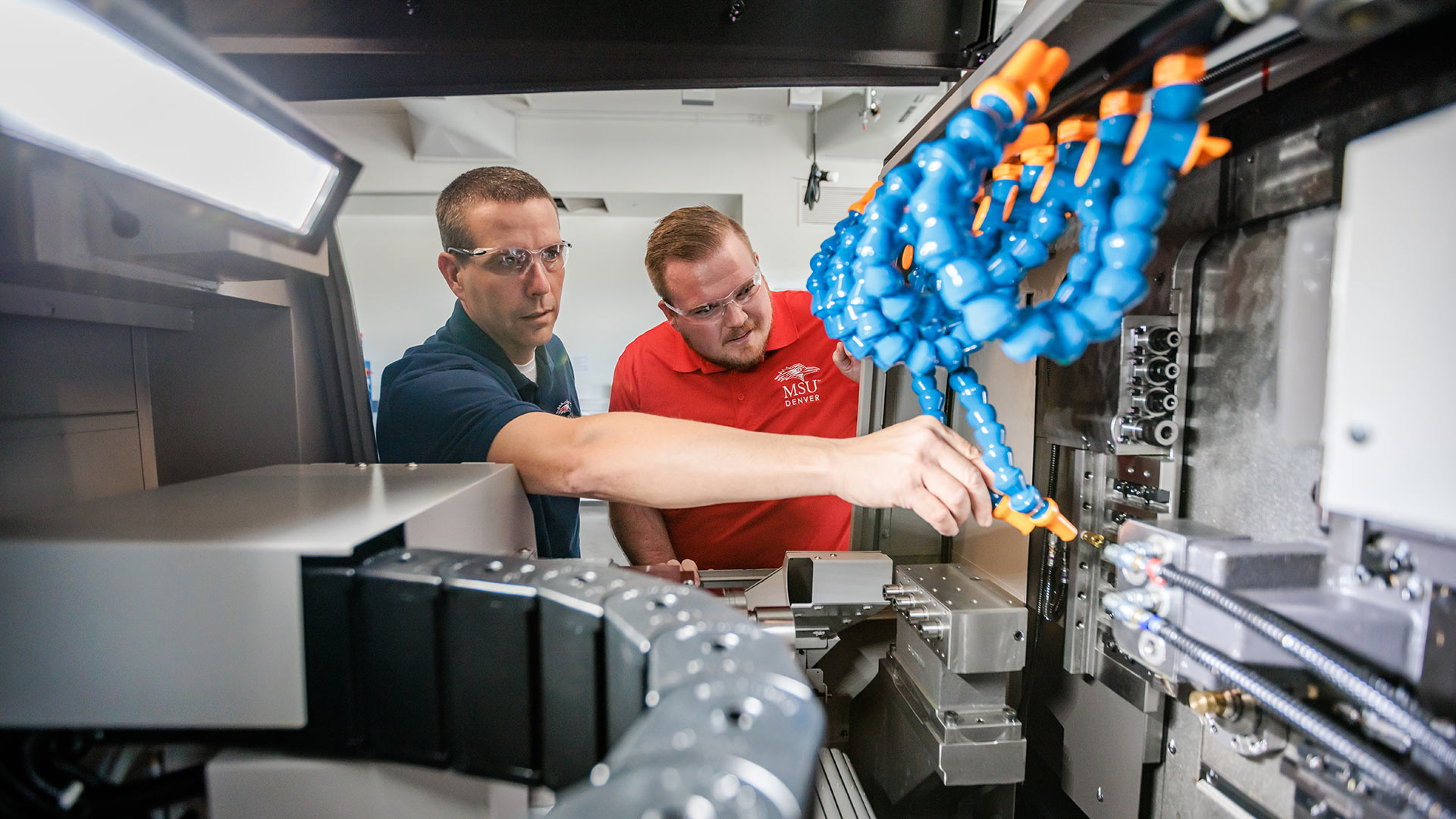 Stephen Morgan and Steven Finch work in MSU Denver's Advanced Manufacturing Sciences Center.