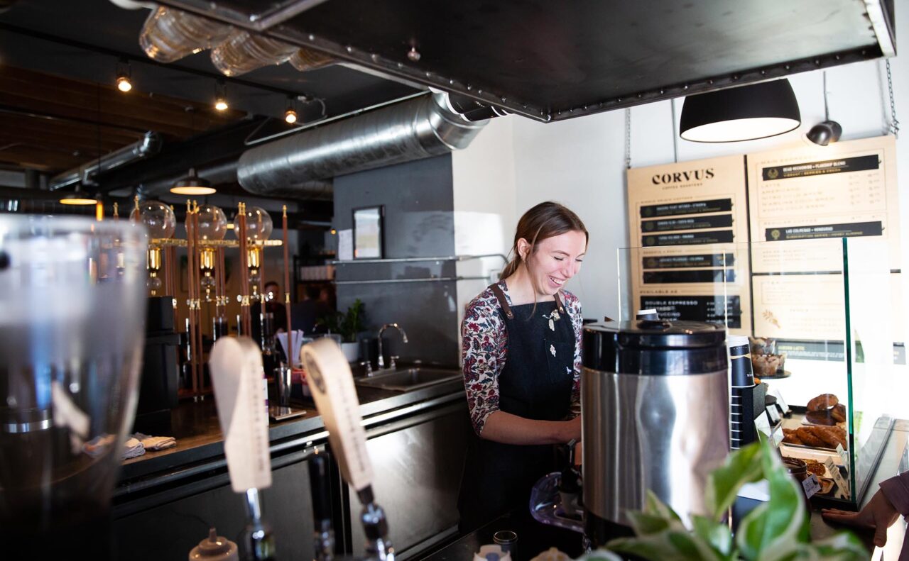 Barista and MSU Denver studentJenna Ladouceur serves coffee at the South Broadway Corvus Coffee location