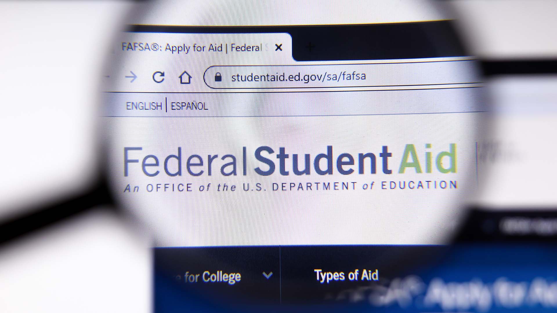 FederalStudentAid website page. Fafsa.ed.gov logo on display screen close-up.