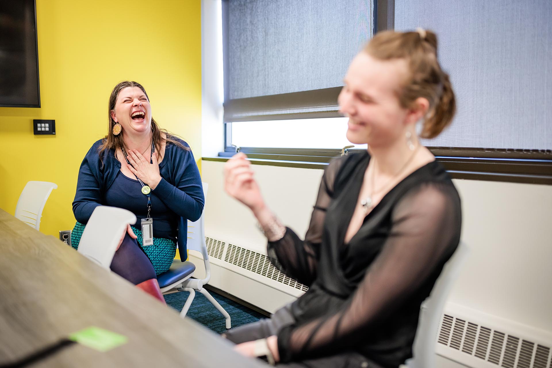 Staff members Traci Hartley, left, and Red Rose work at the Metropolitan State University of Denver’s Department of Speech, Language, Hearing Sciences located in the Central Classroom building