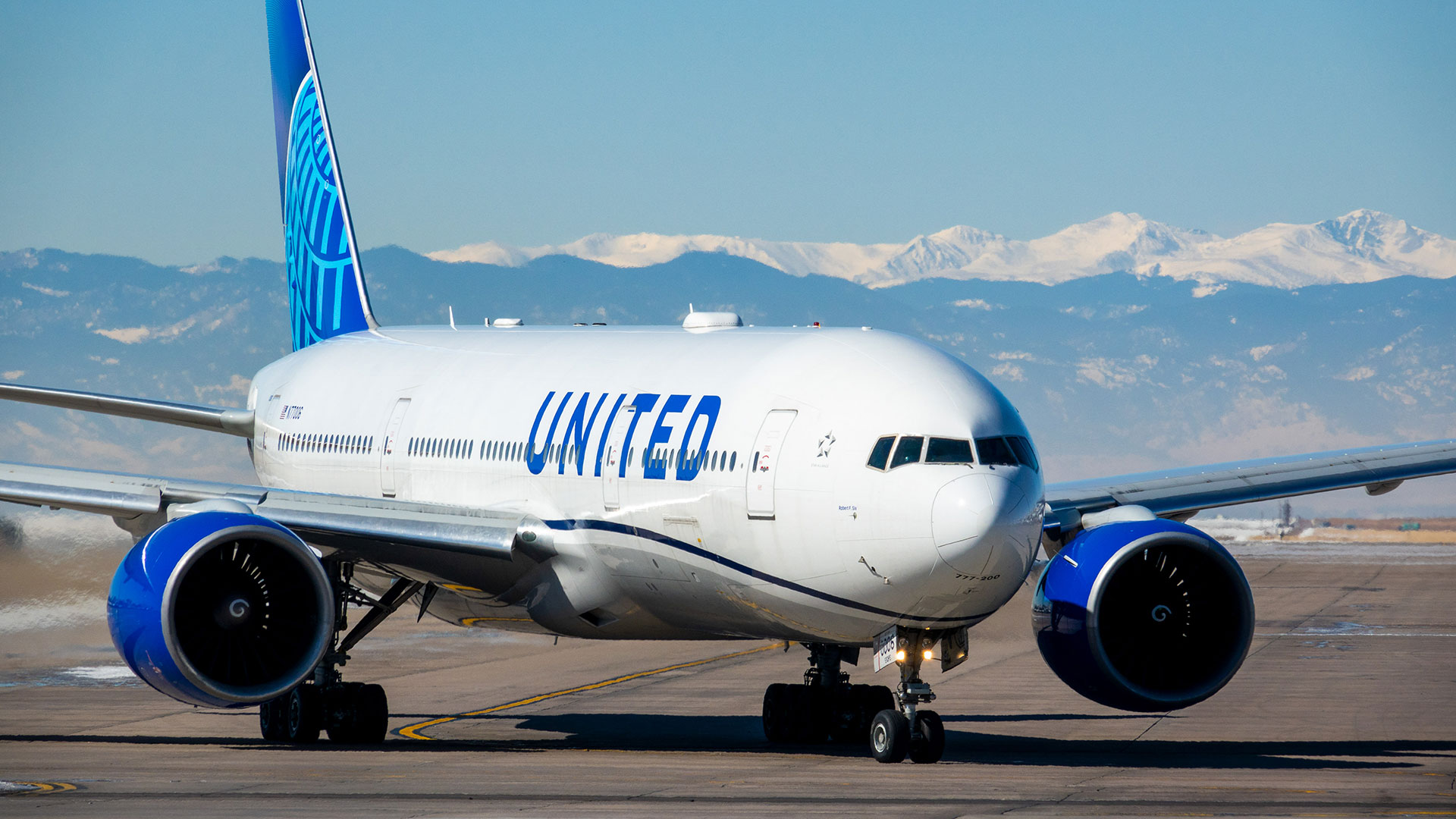 United Airlines plane on runway at Denver International Airport