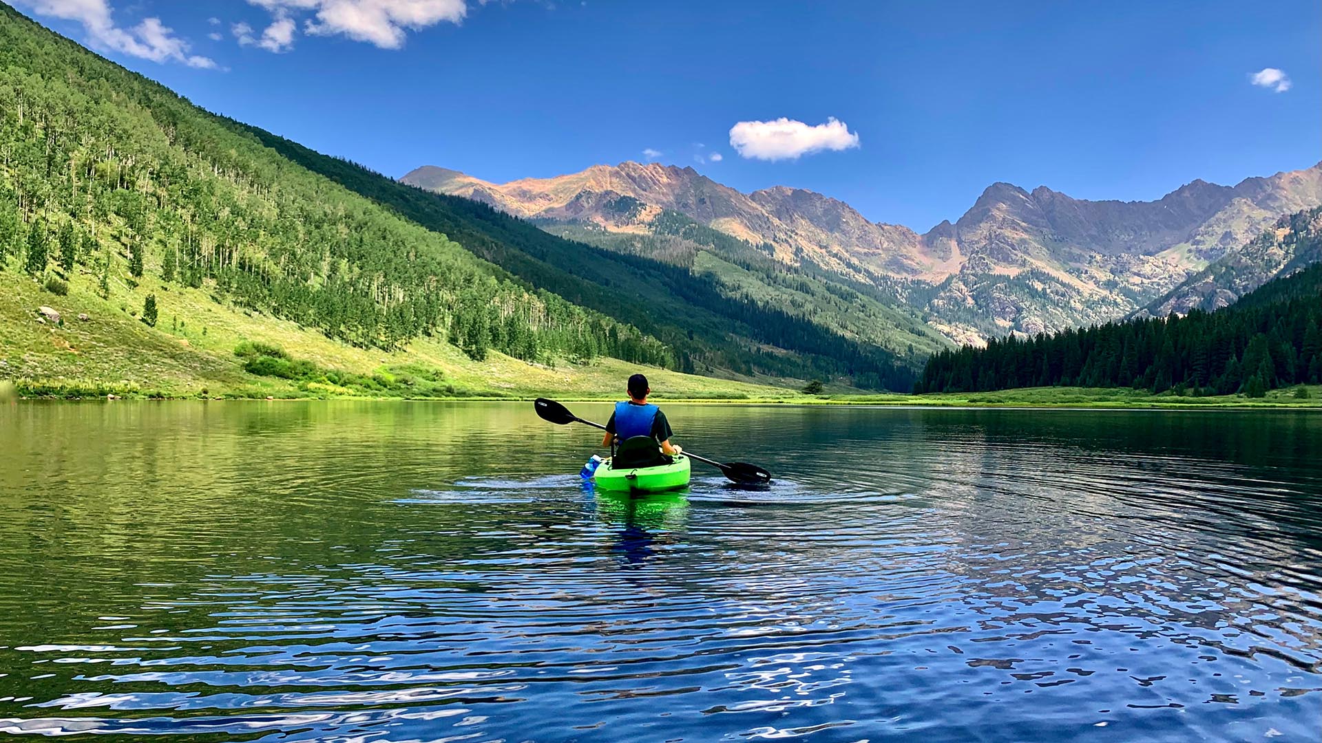 A kayaker on Piney Lake, near Vail, Colorado.