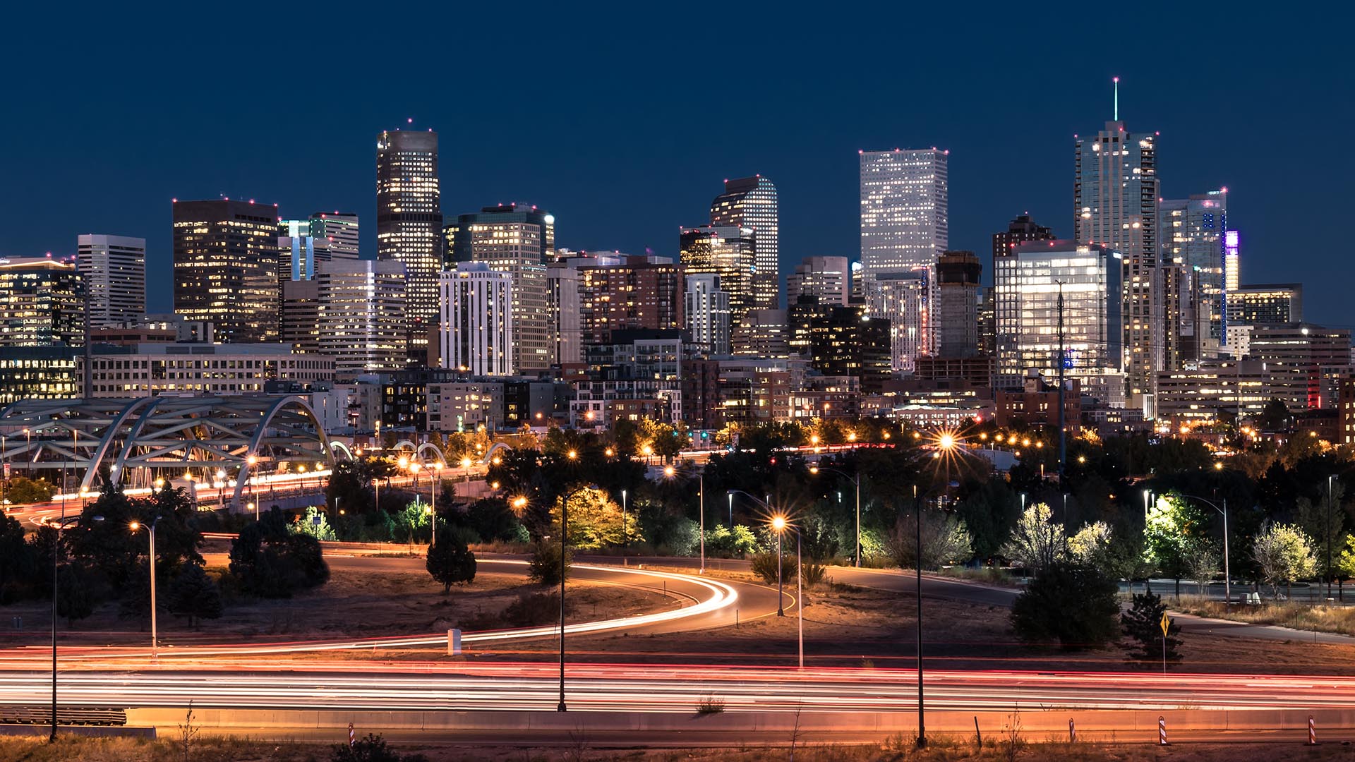 Denver night skyline from across the South Platte River.