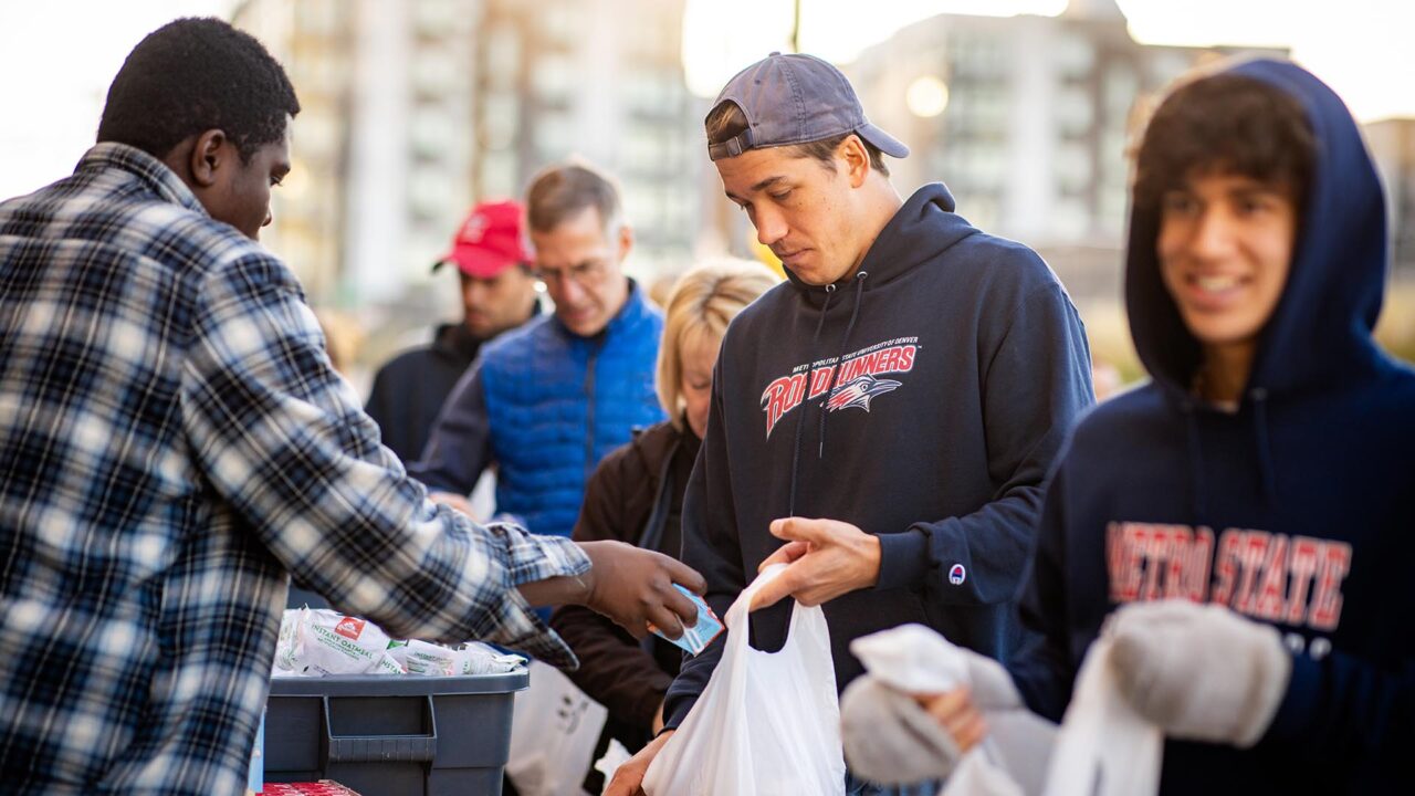 MSU Denver tennis player Juho Kantola volunteers at Food for Thought