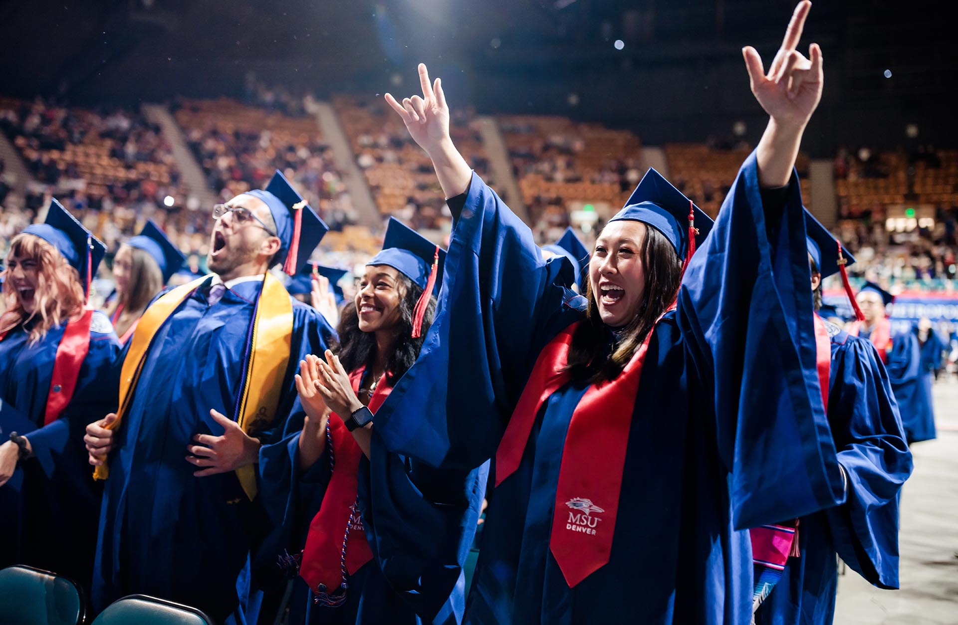 MSU Denver graduates celebrate at the end of the spring 2023 commencement ceremony.