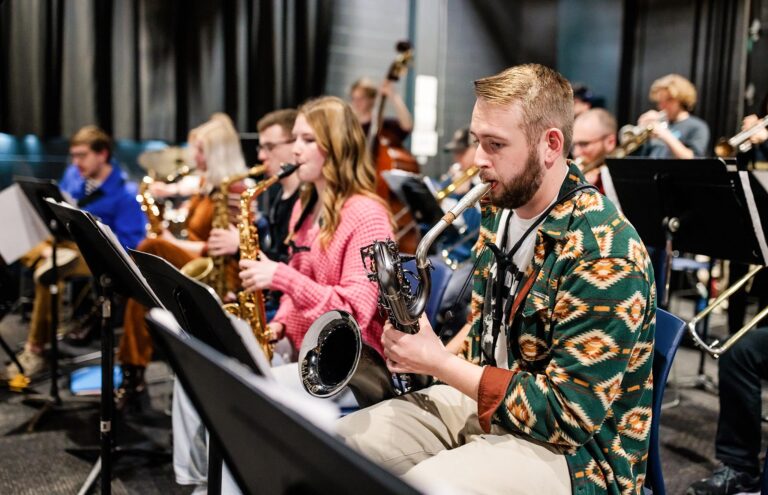 CU Boulder student Will Foster, right, performs at “Big Band Fridays,” a multi-school jazz-ensemble workshop for students at the MSU Denver School of Music Kalamath Building.