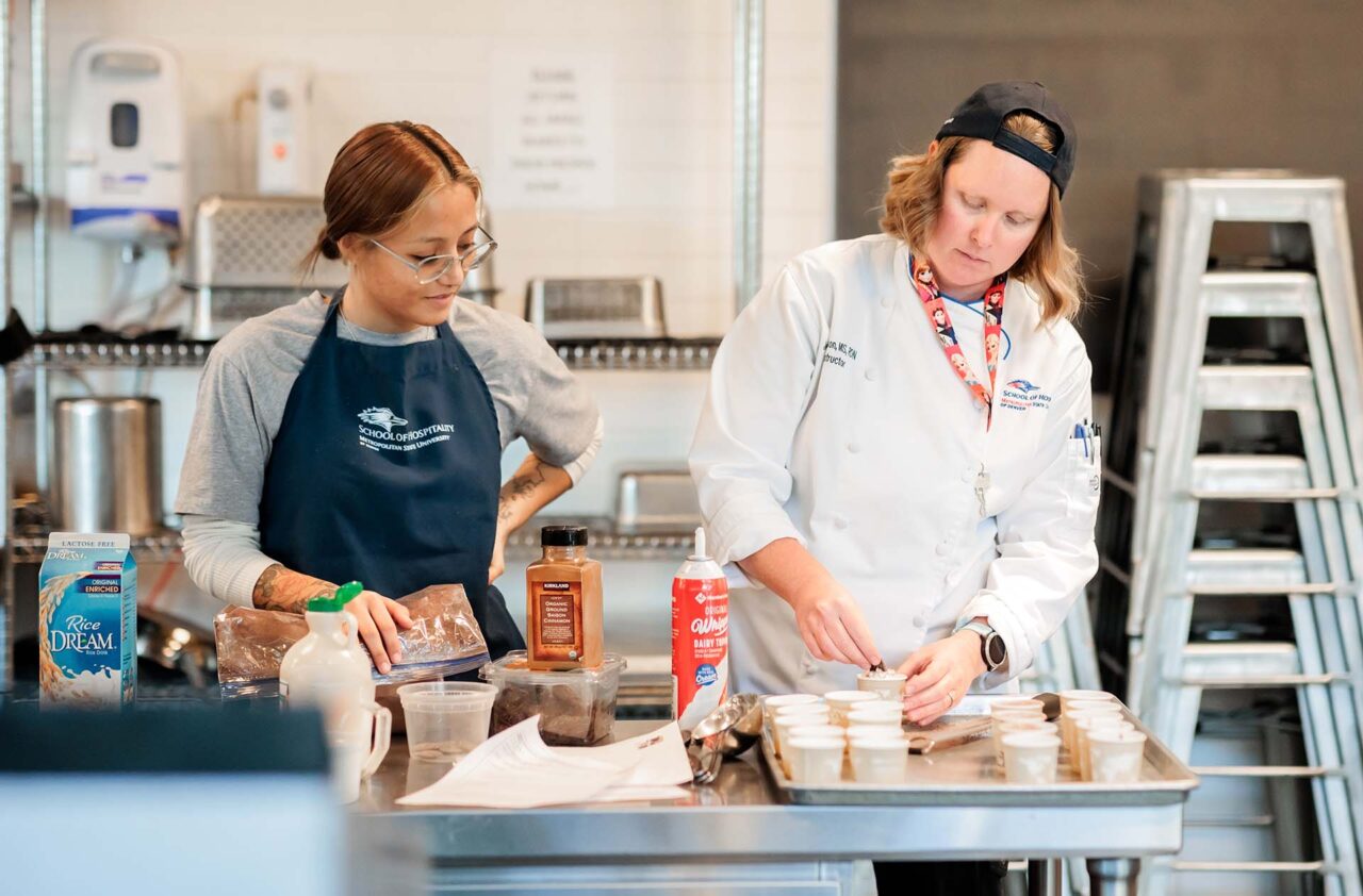 Sofia Tolosa Ramirez (left) of MSU Denver and Professor Jennifer Watson garnish vegan chocolate milkshakes