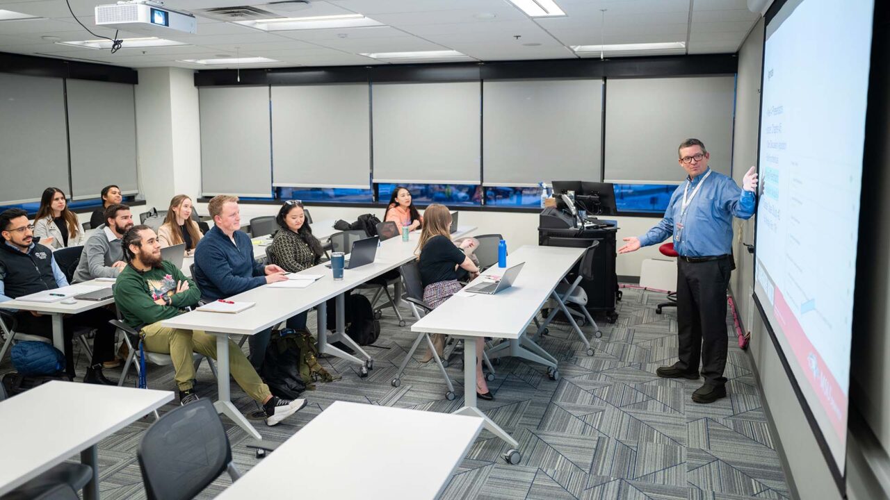 College of Business professor Paul Anderson leads class