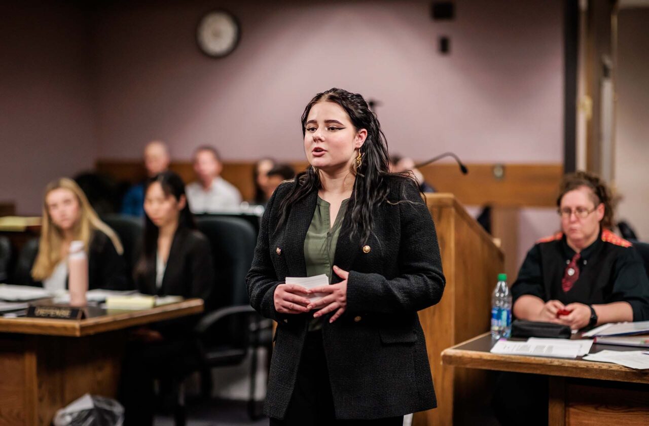 MSU Denver student Cae Draper questions a witness during the American Mock Trial Association Regional Tournament at El Paso County Terry R. Harris Judicial Complex in Colorado Springs