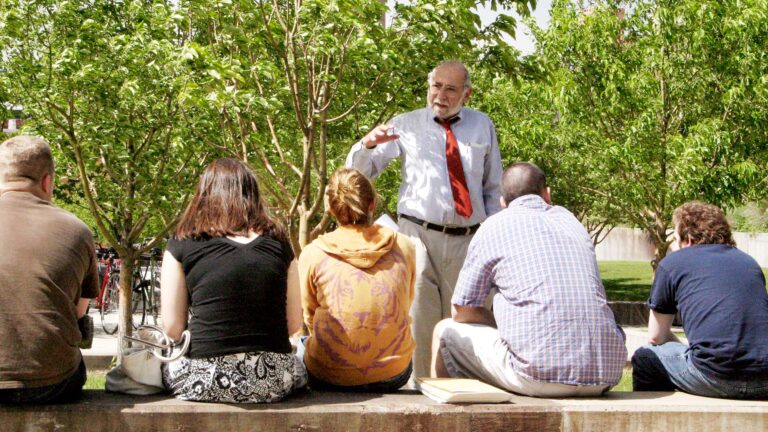 Norm Provizer teaches a class outside