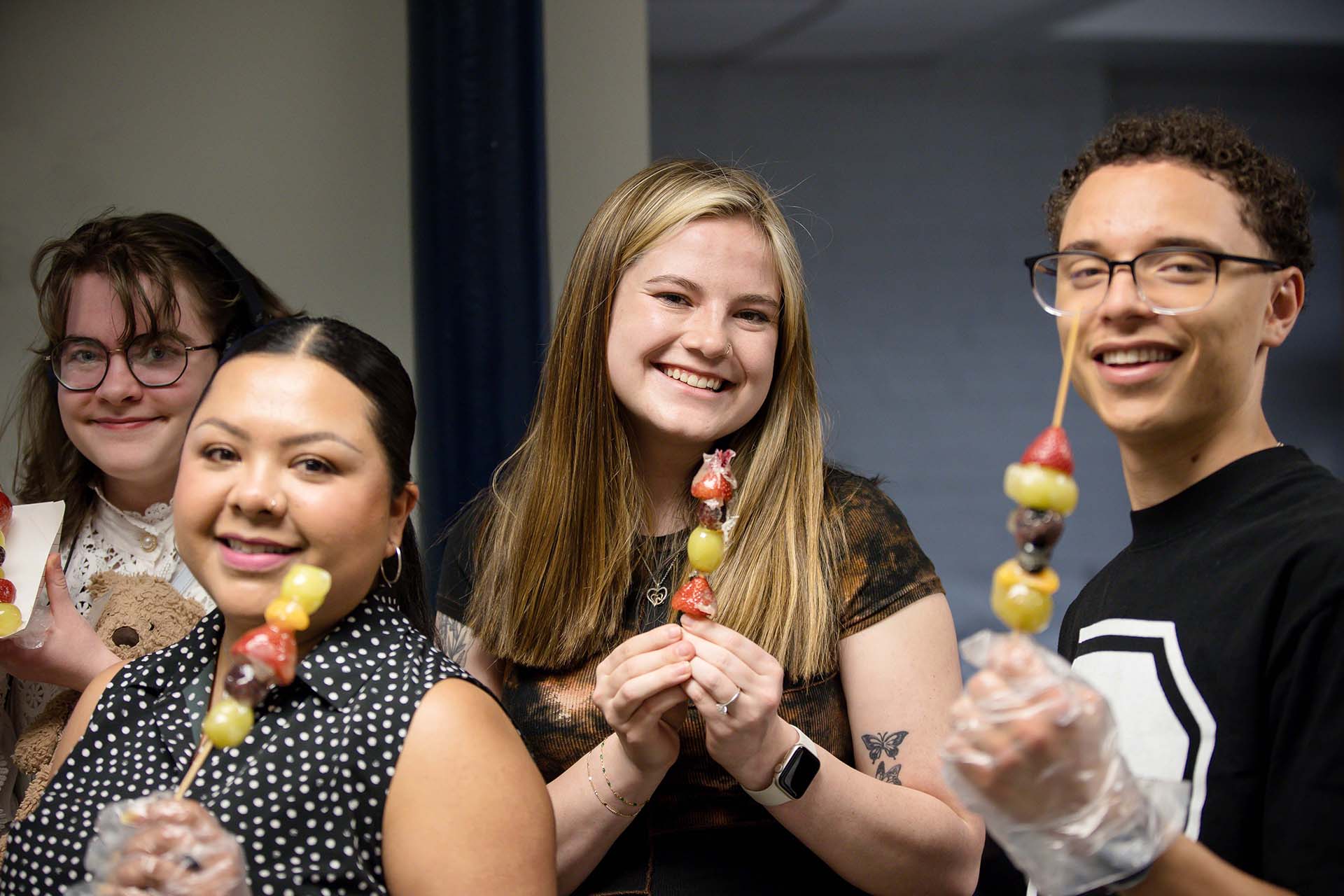From left to right, MSU Denver students Jackson Schwaed, Rebeca Saavedra, Hailey Glass and Cyrus Holt hold their tanghulu