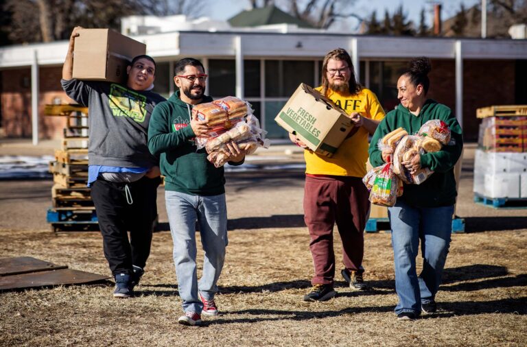 Duane Gurule brings in fresh produce with staff members which is procured from food bank partners and purchased from local farmers.