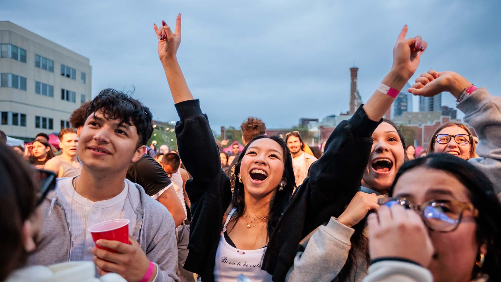 Smiling students outside on the Auraria Campus