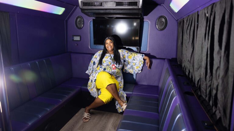 MSU Denver student Victoria Osler inside her licensed cannabis consumption mobile hospitality bus.