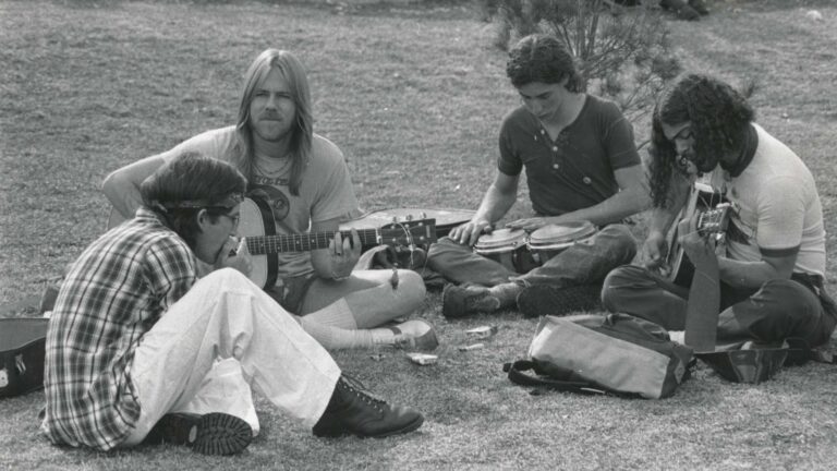 Students play music on campus between classes in the 1970s.