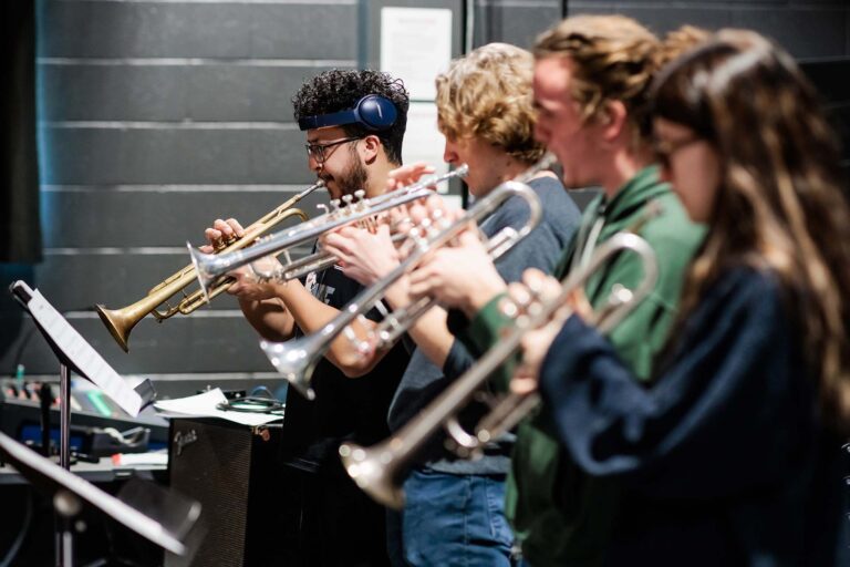 Pedro Lopez, left, and other students practice at Big Band Fridays, a multi-school jazz-ensemble workshop for students at the MSU Denver School of Music Kalamath Building