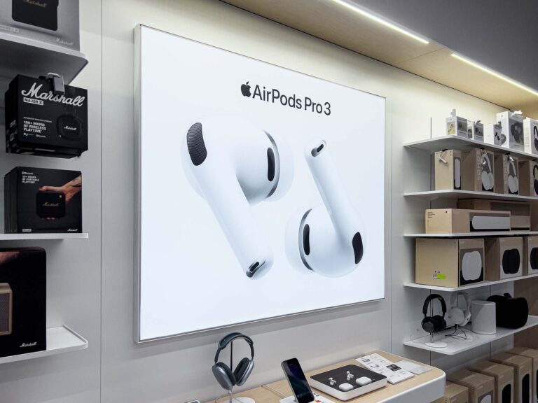 Apple AirPods Pro 3 display stands out in a modern electronics store, also featuring Marshall products