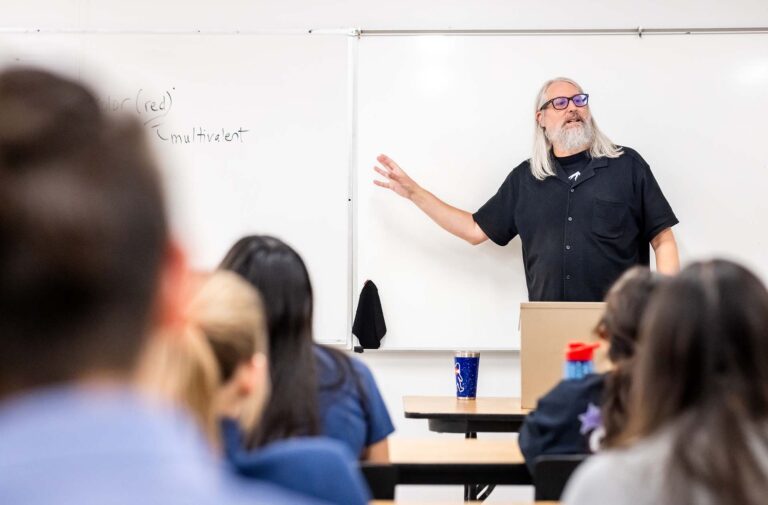 MSU Denver English professor Charles Hoge gives a lecture during his class