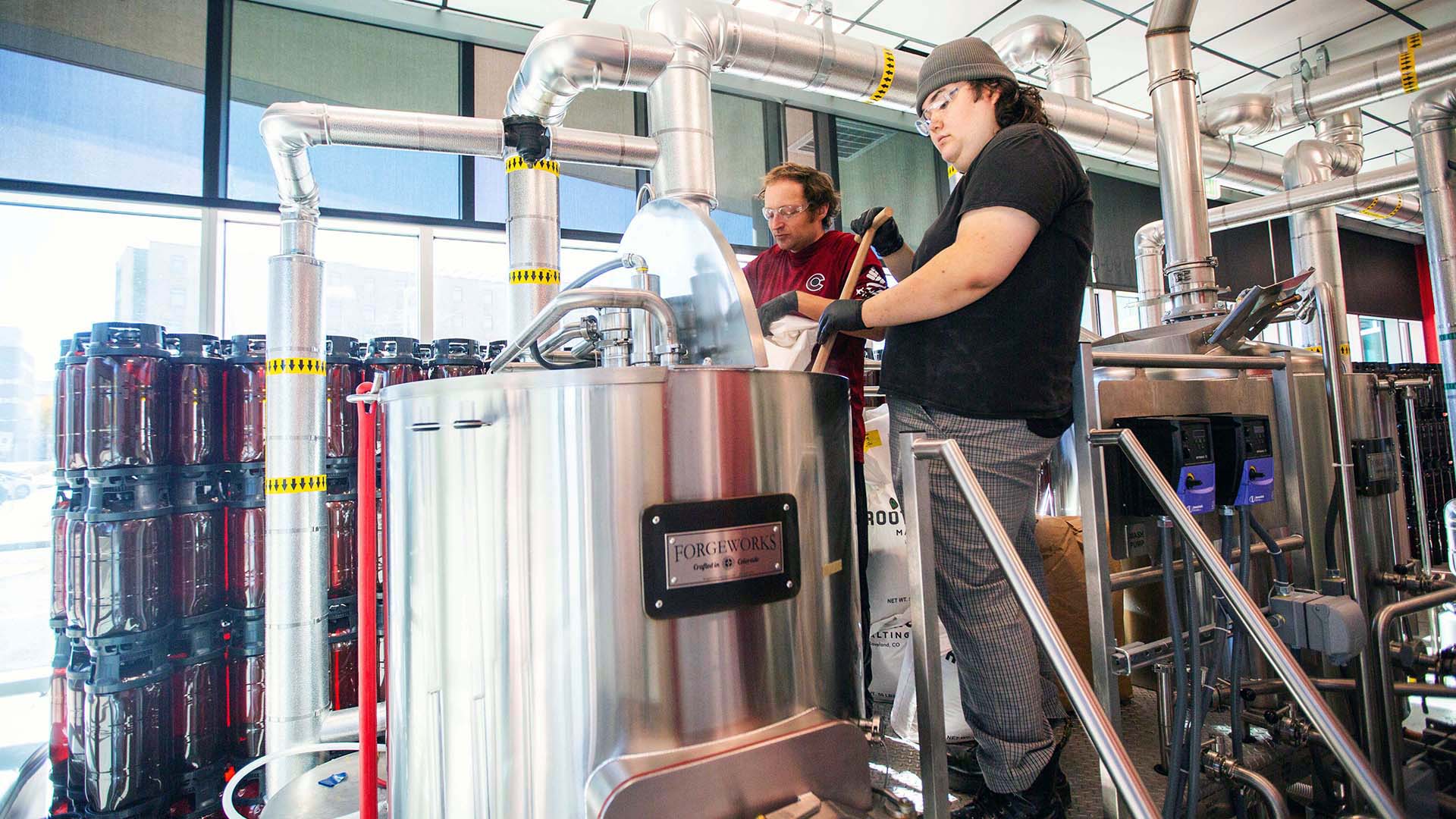 Brewing Operations students Tim Sanders and Josalyn Vasquez brew a cream ale