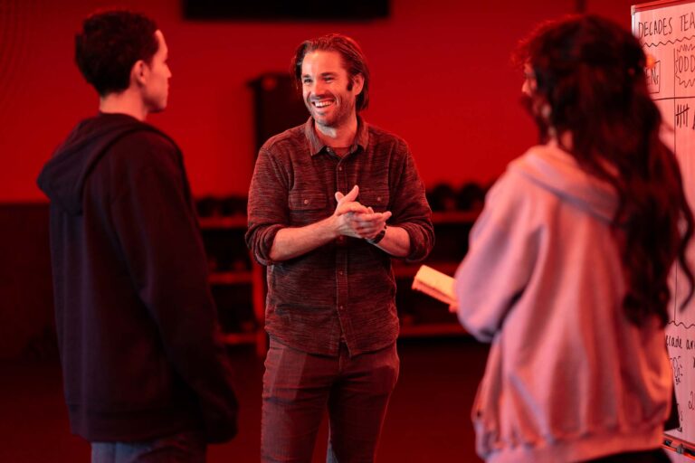MSU Denver associate professor of outdoor recreation Lincoln Davie talks with his students.