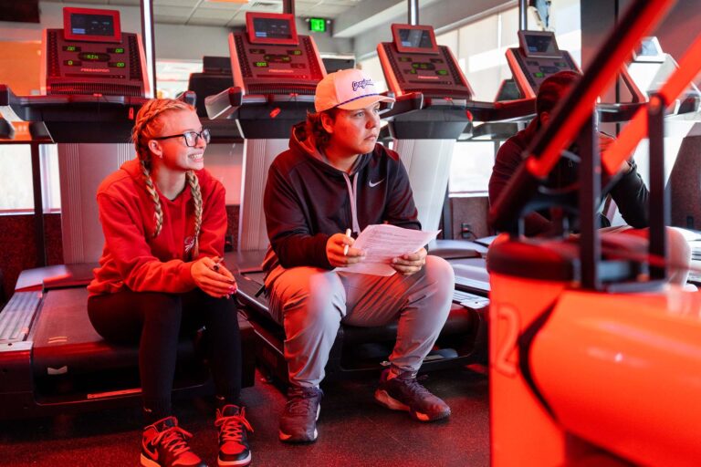 MSU Denver students Emma Pierce and Jordan Aragon analyze store merchandise for sustainability