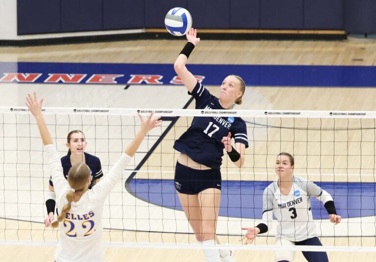 Middle Blocker Kryssa Moerman spikes the ball in the match against Angelo State on Dec. 6, 2025, at MSU Denver.