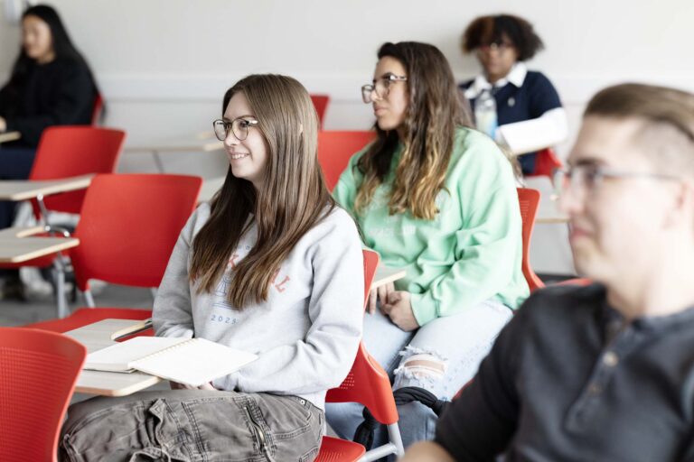 MSU Denver student Emma Fox listens during class
