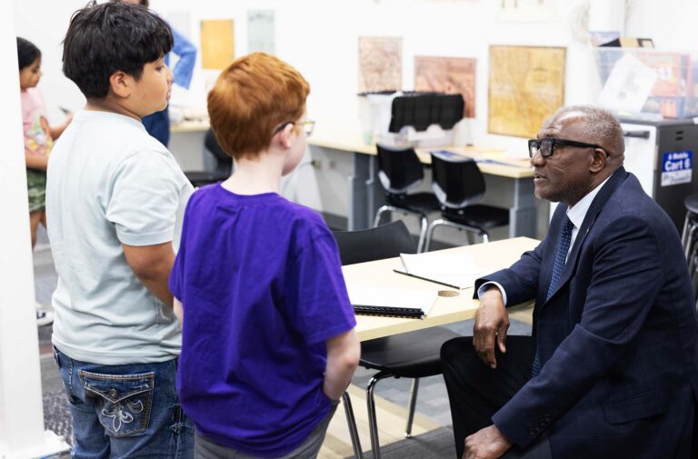 Students Julian Garcia and Ned Barnhart talk with Alfred Tatum, Ph.D.