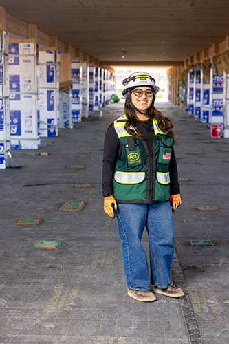MSU Denver Civil Engineering Technology student and PCL intern Claudia Carrillo on the site of Summit House.