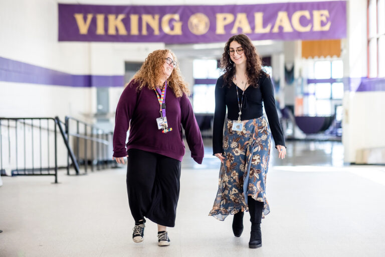Ariana Rabinovich, right, walks with teacher and mentor Heidi DeBernardi at North High School.