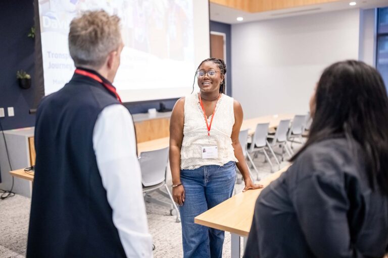 Miah Edwards, a Public Relations student at Metropolitan State University of Denver, speaks to Mark McIntosh of the Transplant Life Foundation.