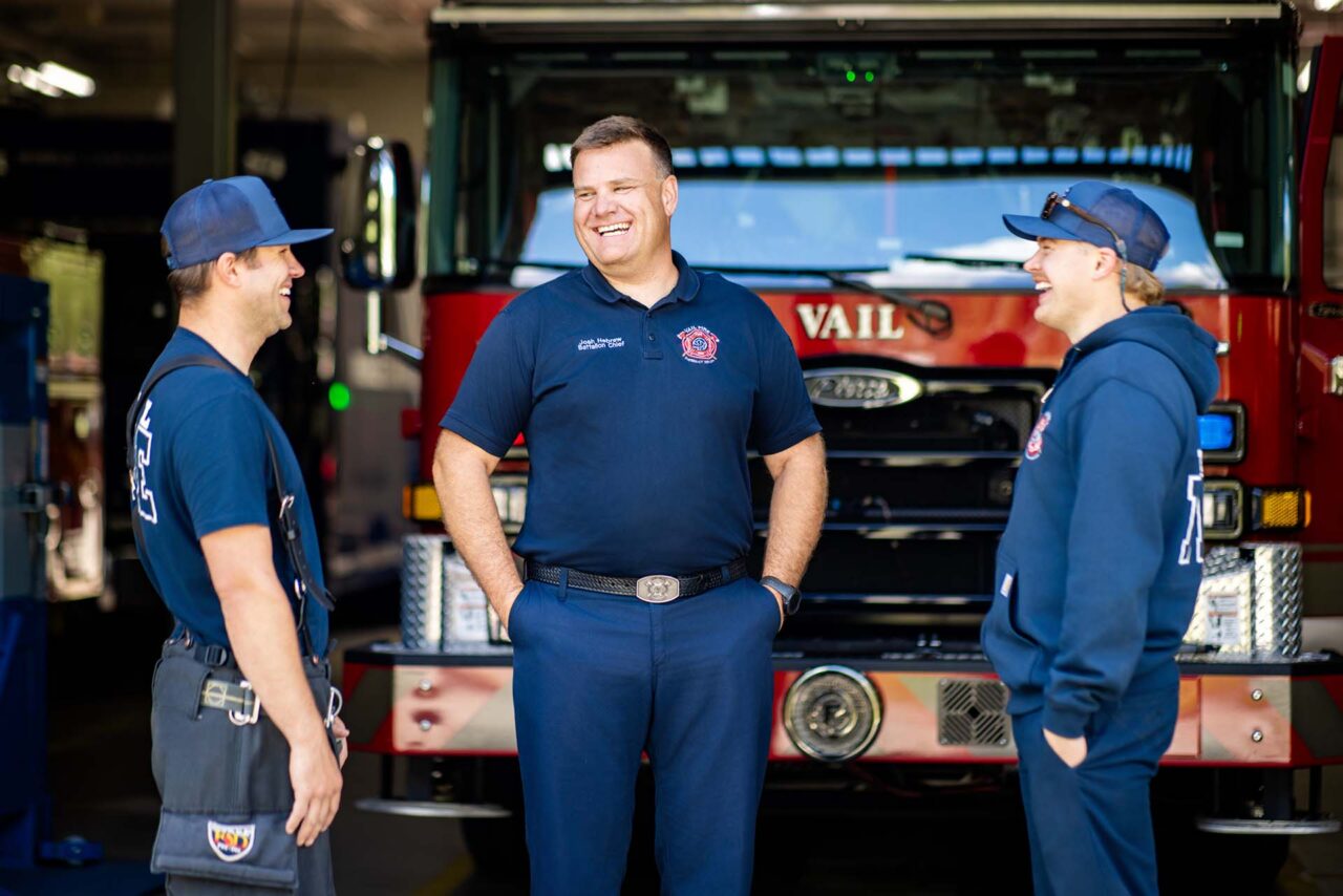 Joshua Hebrew chats with colleagues at the Vail Fire Department.