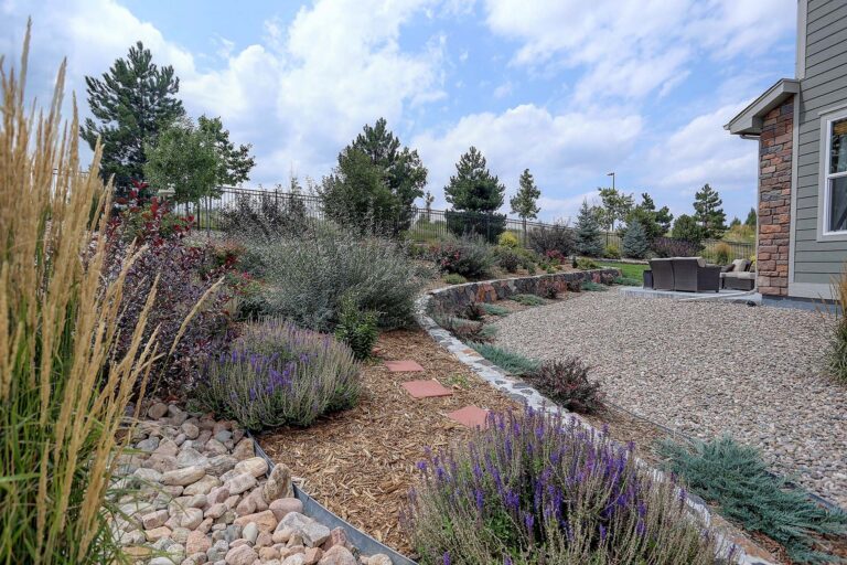 Beautiful residential rock, stone, and plant xeriscape landscap