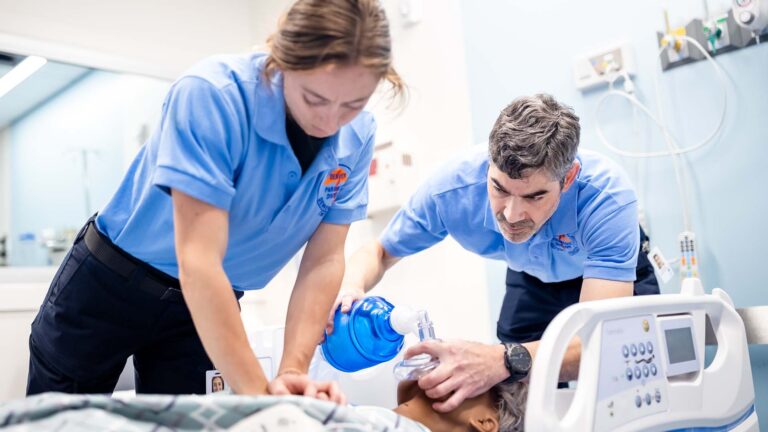 MSU Denver EMT students Carey Sensing and Natalie Cox practice CPR and ventilations on a simulated patient in MSU Denver’s Day Gina and Frank Day Health Institute Simulation and Skills Laboratory.