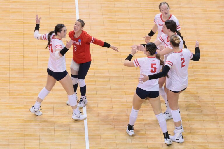 Mia Accomazzo #3 of the MSU Denver Roadrunners celebrates with teammates against the Concordia-St. Paul Golden Bears during the Division II Women’s Volleyball Championship held at Sanford Pentagon on December 13, 2025 in Sioux Falls, South Dakota